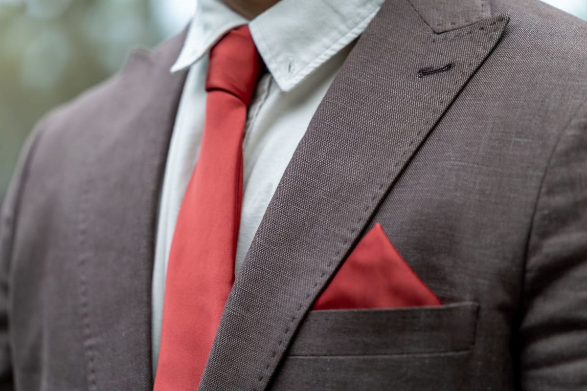 Brown suit red tie — photographed at Singleton, Hunter Valley