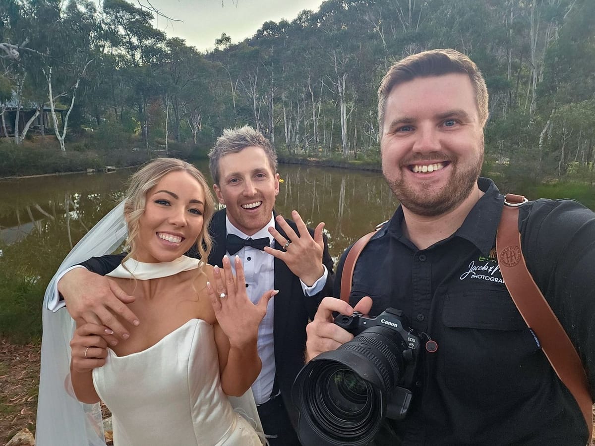 Jacob and Mim photographing a couple's rings at Lawson Park, Hartley Vale
