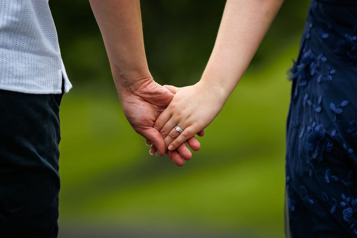 Holding hands — photographed at Mount Annan Botanic Gardens, Mount Annan